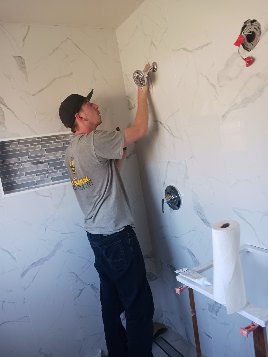 Small Jobs Plumbing, Inc. finishing a Bathroom shower remodel.